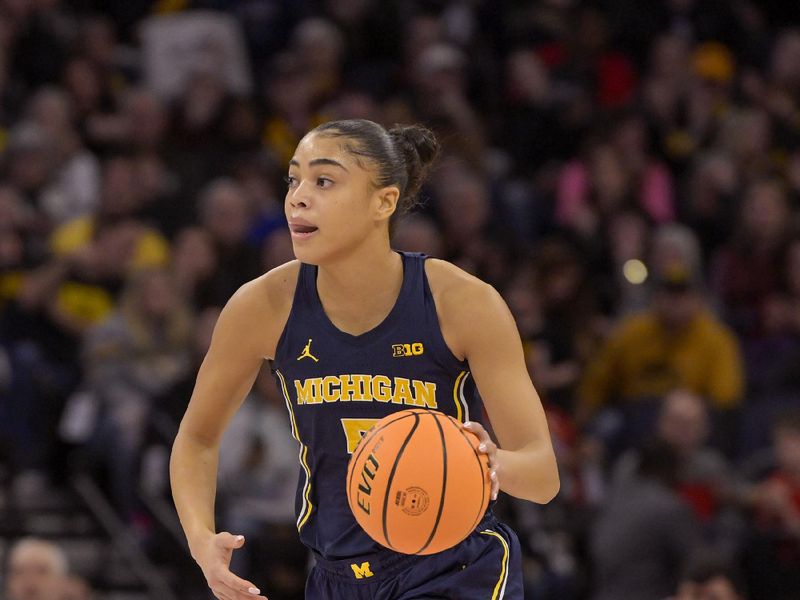 Mar 9, 2024; Minneapolis, MN, USA;  Michigan Wolverines guard 5 Laila Phelia (5) brings the ball up-court against the Iowa Hawkeyes during the first half of a Big Ten Women's Basketball tournament semifinal at Target Center. Mandatory Credit: Nick Wosika-USA TODAY Sports