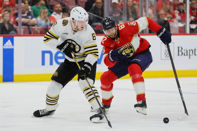 May 6, 2024; Sunrise, Florida, USA; Boston Bruins defenseman Mason Lohrei (6) moves the puck past Florida Panthers center Kevin Stenlund (82) during the second period in game one of the second round of the 2024 Stanley Cup Playoffs at Amerant Bank Arena. Mandatory Credit: Sam Navarro-USA TODAY Sports