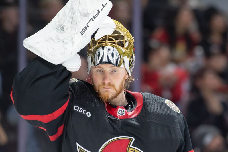 Jan 20, 2024; Ottawa, Ontario, CAN; Ottawa Senators goalie Joonas Korpisalo (70) prior to the start of the second period against the Winnipeg Jets in the second period at the Canadian Tire Centre. Mandatory Credit: Marc DesRosiers-USA TODAY Sports