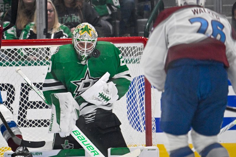 May 9, 2024; Dallas, Texas, USA; Dallas Stars goaltender Jake Oettinger (29) stops a shot by Colorado Avalanche left wing Miles Wood (28) during the second period in game two of the second round of the 2024 Stanley Cup Playoffs at American Airlines Center. Mandatory Credit: Jerome Miron-USA TODAY Sports