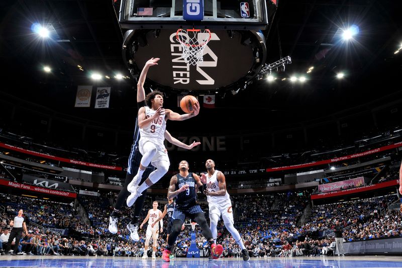 ORLANDO, FL - JANUARY 22: Craig Porter #9 of the Cleveland Cavaliers drives to the basket during the game against the Orlando Magic on January 22, 2024 at Kia Center in Orlando, Florida. NOTE TO USER: User expressly acknowledges and agrees that, by downloading and or using this photograph, User is consenting to the terms and conditions of the Getty Images License Agreement. Mandatory Copyright Notice: Copyright 2024 NBAE (Photo by Fernando Medina/NBAE via Getty Images)