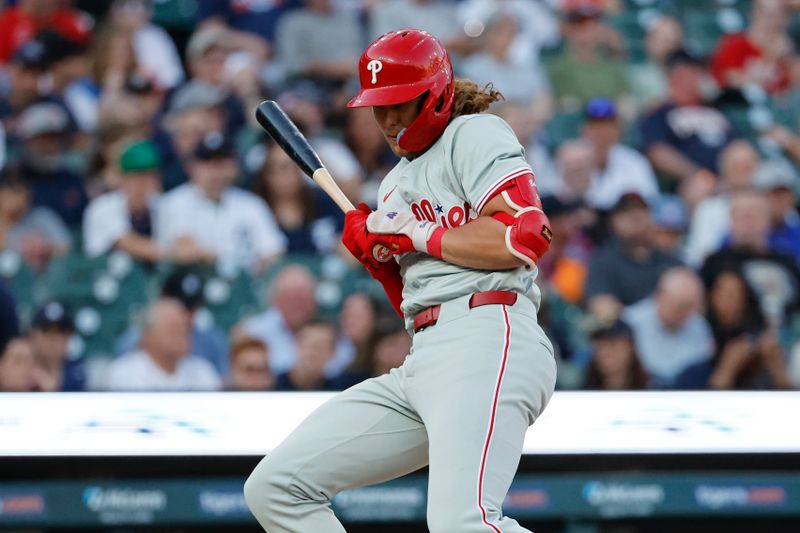 Jun 24, 2024; Detroit, Michigan, USA;  Philadelphia Phillies third baseman Alec Bohm (28) reacts to an inside pitch in the fifth inning against the Detroit Tigers at Comerica Park. Mandatory Credit: Rick Osentoski-USA TODAY Sports