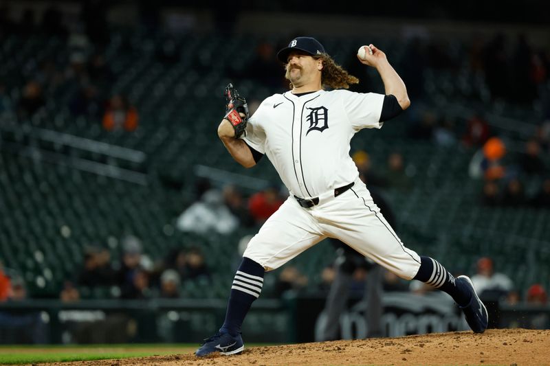 Apr 12, 2024; Detroit, Michigan, USA;  Detroit Tigers relief pitcher Andrew Chafin (17) pitches in the eighth inning against the Minnesota Twins at Comerica Park. Mandatory Credit: Rick Osentoski-USA TODAY Sports