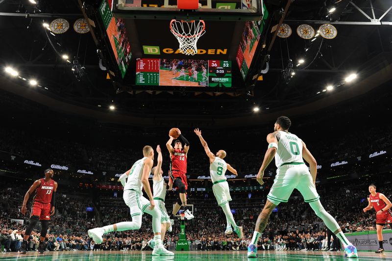 BOSTON, MA - APRIL 21: Tyler Herro #14 of the Miami Heat shoots the ball during the game against the Boston Celtics during Round 1 Game 1 of the 2024 NBA Playoffs on April 21, 2024 at the TD Garden in Boston, Massachusetts. NOTE TO USER: User expressly acknowledges and agrees that, by downloading and or using this photograph, User is consenting to the terms and conditions of the Getty Images License Agreement. Mandatory Copyright Notice: Copyright 2024 NBAE  (Photo by Brian Babineau/NBAE via Getty Images)