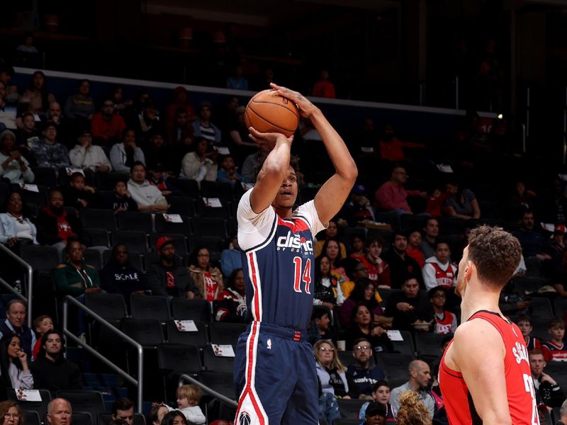 WASHINGTON, DC -? APRIL 9: Isaiah Todd #14 of the Washington Wizards shoots a three point basket during the game against the Houston Rockets  on April 9, 2023 at Capital One Arena in Washington, DC. NOTE TO USER: User expressly acknowledges and agrees that, by downloading and or using this Photograph, user is consenting to the terms and conditions of the Getty Images License Agreement. Mandatory Copyright Notice: Copyright 2023 NBAE (Photo by Stephen Gosling/NBAE via Getty Images)