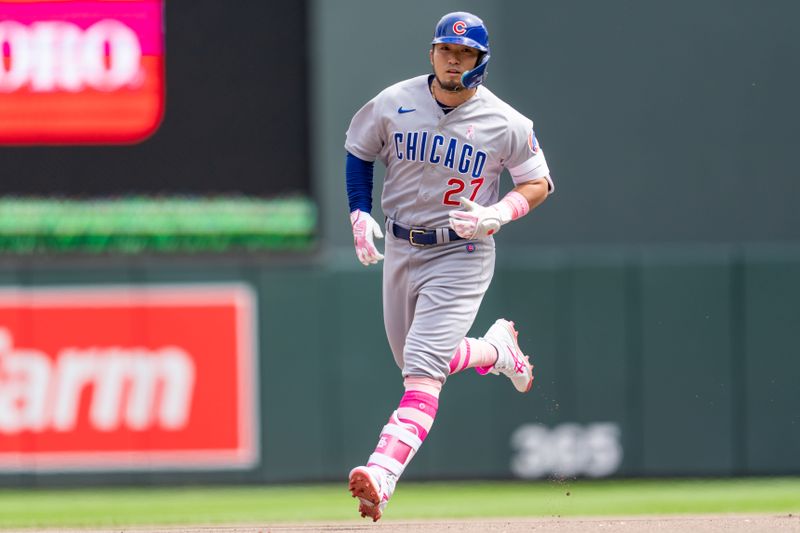 May 14, 2023; Minneapolis, Minnesota, USA; Chicago Cubs right fielder Seiya Suzuki (27) rounds second base after hitting a home run off Minnesota Twins starting pitcher Louie Varland (37) in the seventh inning at Target Field. Mandatory Credit: Matt Blewett-USA TODAY Sports