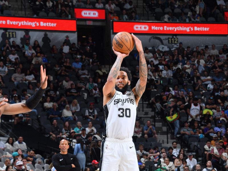 SAN ANTONIO, TX - APRIL 14: Julian Champagnie #30  of the San Antonio Spurs shoots a three point basket against the Detroit Pistons on April 14, 2024 at the Frost Bank Center in San Antonio, Texas. NOTE TO USER: User expressly acknowledges and agrees that, by downloading and or using this photograph, user is consenting to the terms and conditions of the Getty Images License Agreement. Mandatory Copyright Notice: Copyright 2024 NBAE (Photos by Michael Gonzales/NBAE via Getty Images)