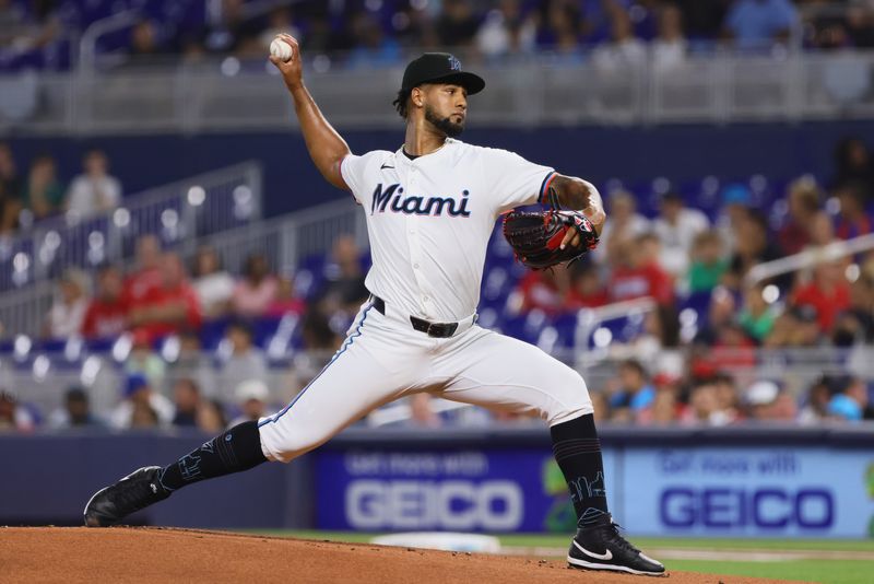 Aug 5, 2024; Miami, Florida, USA; Miami Marlins starting pitcher Roddery Munoz (71) delivers a pitch against the Cincinnati Reds during the first inning at loanDepot Park. Mandatory Credit: Sam Navarro-USA TODAY Sports