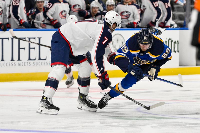 Oct 1, 2024; St. Louis, Missouri, USA;  St. Louis Blues left wing Pavel Buchnevich (89) is tripped by Columbus Blue Jackets center Sean Kuraly (7) during the second period at Enterprise Center. Mandatory Credit: Jeff Curry-Imagn Images