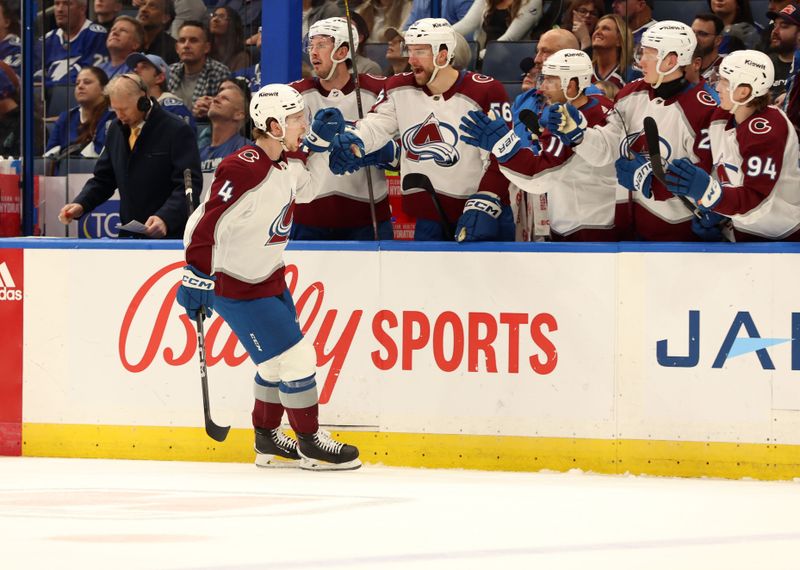 Feb 15, 2024; Tampa, Florida, USA; Colorado Avalanche defenseman Bowen Byram (4) celebrates with teammates after he scored a goal against the Tampa Bay Lightning during the first period at Amalie Arena. Mandatory Credit: Kim Klement Neitzel-USA TODAY Sports