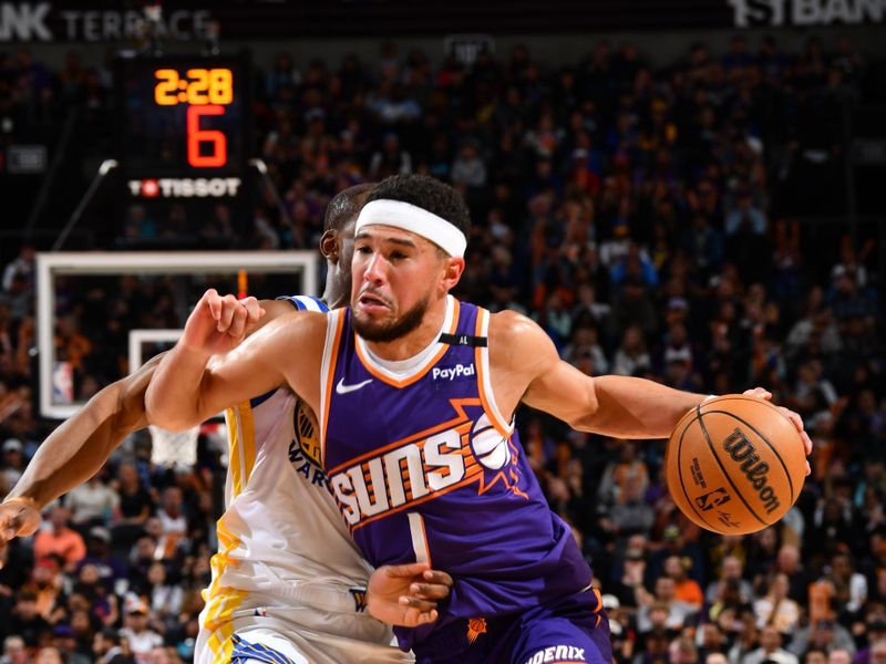 PHOENIX, AZ - NOVEMBER 30: Devin Booker #1 of the Phoenix Suns dribbles the ball during the game against the Golden State Warriors on November 30, 2024 at Footprint Center in Phoenix, Arizona. NOTE TO USER: User expressly acknowledges and agrees that, by downloading and or using this photograph, user is consenting to the terms and conditions of the Getty Images License Agreement. Mandatory Copyright Notice: Copyright 2024 NBAE (Photo by Barry Gossage/NBAE via Getty Images)