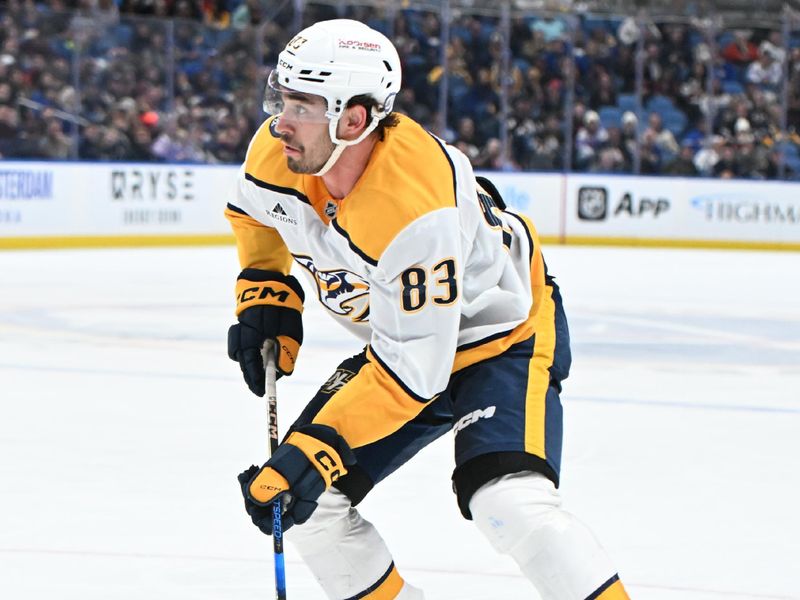 Jan 31, 2025; Buffalo, New York, USA; Nashville Predators defenseman Adam Wilsby (83) looks to take a shot against the Buffalo Sabres in the third period at the KeyBank Center. Mandatory Credit: Mark Konezny-Imagn Images