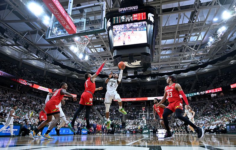 Feb 7, 2023; East Lansing, Michigan, USA; Michigan State Spartans guard Tyson Walker (2) drives into the paint for a shot against the Maryland Terrapins in the second half at Jack Breslin Student Events Center. Mandatory Credit: Dale Young-USA TODAY Sports