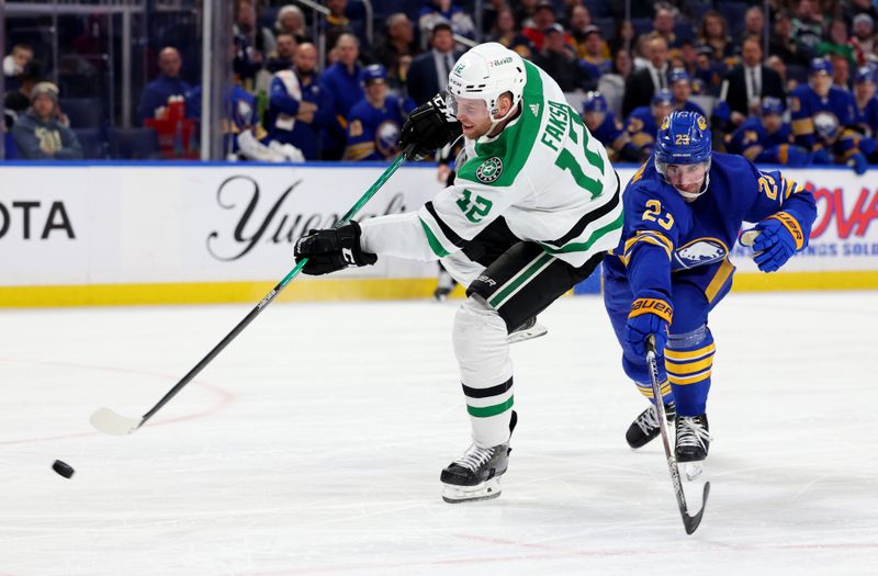 Mar 9, 2023; Buffalo, New York, USA;  Dallas Stars center Radek Faksa (12) takes a shot on goal and scores during the third period against the Buffalo Sabres at KeyBank Center. Mandatory Credit: Timothy T. Ludwig-USA TODAY Sports