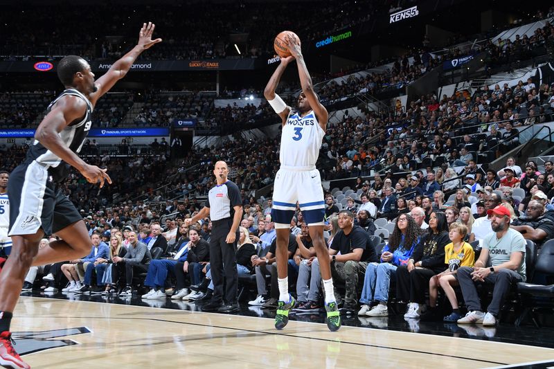 SAN ANTONIO, TX - NOVEMBER 2: Jaden McDaniels #3 of the Minnesota Timberwolves shoots a three point basket during the game against the San Antonio Spurs on November 2, 2024 at the Frost Bank Center in San Antonio, Texas. NOTE TO USER: User expressly acknowledges and agrees that, by downloading and or using this photograph, user is consenting to the terms and conditions of the Getty Images License Agreement. Mandatory Copyright Notice: Copyright 2024 NBAE (Photos by Michael Gonzales/NBAE via Getty Images)