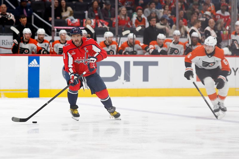 Mar 1, 2024; Washington, District of Columbia, USA; Washington Capitals left wing Alex Ovechkin (8) passes the puck as Philadelphia Flyers defenseman Travis Sanheim (6) chases in the second period at Capital One Arena. Mandatory Credit: Geoff Burke-USA TODAY Sports