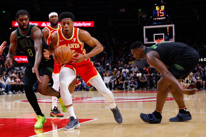 ATLANTA, GEORGIA - MARCH 10: De'Andre Hunter #12 of the Atlanta Hawks loses control of the ball during the second quarter against the New Orleans Pelicans at State Farm Arena on March 10, 2024 in Atlanta, Georgia. NOTE TO USER: User expressly acknowledges and agrees that, by downloading and or using this photograph, User is consenting to the terms and conditions of the Getty Images License Agreement. (Photo by Todd Kirkland/Getty Images)