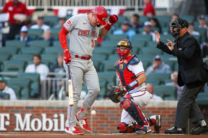 Apr 11, 2023; Atlanta, Georgia, USA; Cincinnati Reds catcher Tyler Stephenson (37) reacts after being hit by a pitch against the Atlanta Braves in the first inning at Truist Park. Mandatory Credit: Brett Davis-USA TODAY Sports