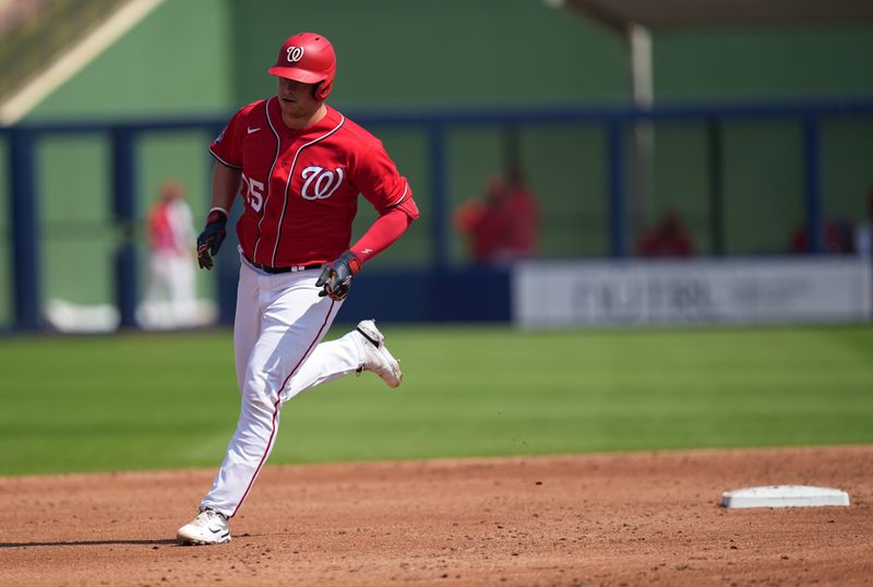 Feb 26, 2023; West Palm Beach, Florida, USA;  Washington Nationals catcher Riley Adams (15) rounds second base after hitting a home run in the second inning against the Houston Astros at The Ballpark of the Palm Beaches. Mandatory Credit: Jim Rassol-USA TODAY Sports