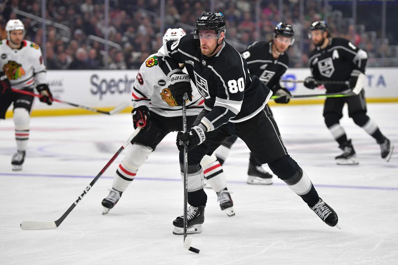 Apr 18, 2024; Los Angeles, California, USA;  Los Angeles Kings center Pierre-Luc Dubois (80) moves in for a shot against the Chicago Blackhawks during the second period at Crypto.com Arena. Mandatory Credit: Gary A. Vasquez-USA TODAY Sports