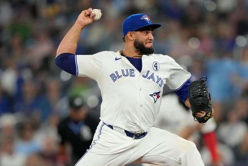 Jun 2, 2024; Toronto, Ontario, CAN; Toronto Blue Jays pitcher Yimi García (93) pitches against the Pittsburgh Pirates during the ninth inning at Rogers Centre. Mandatory Credit: John E. Sokolowski-USA TODAY Sports