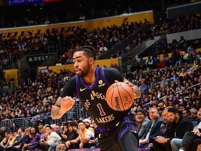 LOS ANGELES, CA - DECEMBER 18:  D'Angelo Russell #1 of the Los Angeles Lakers goes to the basket during the game on December 18, 2023 at Crypto.Com Arena in Los Angeles, California. NOTE TO USER: User expressly acknowledges and agrees that, by downloading and/or using this Photograph, user is consenting to the terms and conditions of the Getty Images License Agreement. Mandatory Copyright Notice: Copyright 2023 NBAE (Photo by Adam Pantozzi/NBAE via Getty Images)