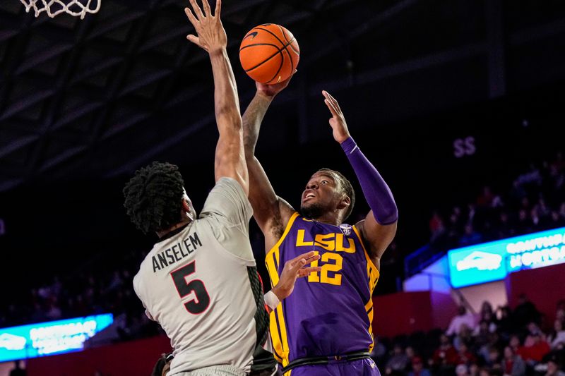 Feb 14, 2023; Athens, Georgia, USA; LSU Tigers forward KJ Williams (12) shoots against Georgia Bulldogs center Frank Anselem (5) during the first half at Stegeman Coliseum. Mandatory Credit: Dale Zanine-USA TODAY Sports