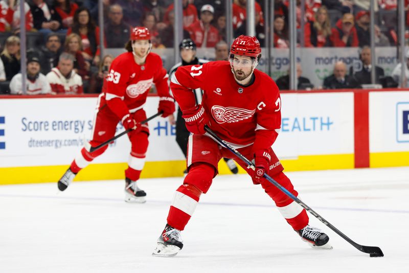 Jan 25, 2025; Detroit, Michigan, USA;  Detroit Red Wings center Dylan Larkin (71) skates with the puck in the second period against the Tampa Bay Lightning at Little Caesars Arena. Mandatory Credit: Rick Osentoski-Imagn Images