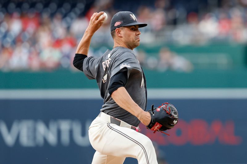Jul 20, 2024; Washington, District of Columbia, USA; Washington Nationals starting pitcher MacKenzie Gore (1) pitches against the Cincinnati Reds during the first inning at Nationals Park. Mandatory Credit: Geoff Burke-USA TODAY Sports