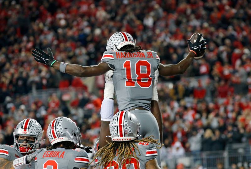 Nov 11, 2023; Columbus, Ohio, USA;  Ohio State Buckeyes wide receiver Marvin Harrison Jr. (18) celebrates his touchdown during the first quarter against the Michigan State Spartans at Ohio Stadium. Mandatory Credit: Joseph Maiorana-USA TODAY Sports