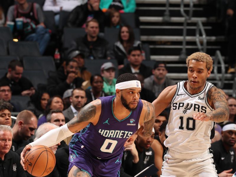 CHARLOTTE, NC - JANUARY 19: Miles Bridges #0 of the Charlotte Hornets handles the ball during the game against the San Antonio Spurs on January 19, 2024 at Spectrum Center in Charlotte, North Carolina. NOTE TO USER: User expressly acknowledges and agrees that, by downloading and or using this photograph, User is consenting to the terms and conditions of the Getty Images License Agreement. Mandatory Copyright Notice: Copyright 2024 NBAE (Photo by Kent Smith/NBAE via Getty Images)