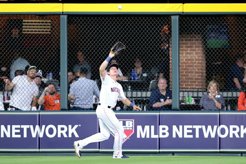 May 2, 2023; Houston, Texas, USA; Houston Astros center fielder Jake Meyers (6) catches a fly ball against the San Francisco Giants during the seventh inning at Minute Maid Park. Mandatory Credit: Erik Williams-USA TODAY Sports