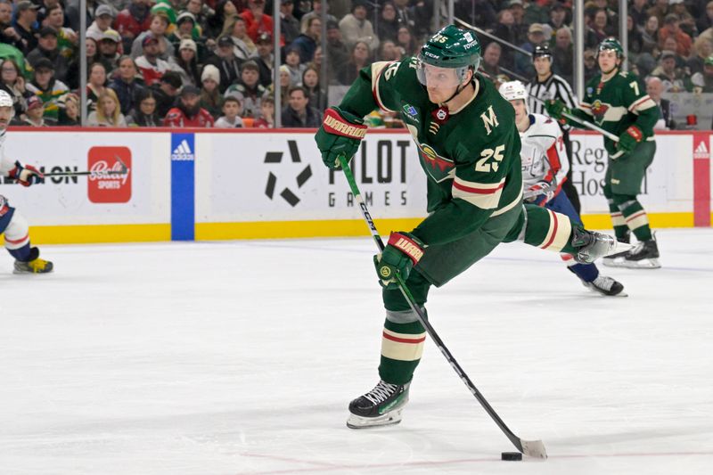 Jan 23, 2024; Saint Paul, Minnesota, USA;  Minnesota Wild defenseman Jonas Brodin (25) takes a shot on goal against the Washington Capitals during the second period at Xcel Energy Center. Mandatory Credit: Nick Wosika-USA TODAY Sports