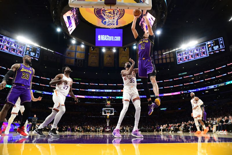 LOS ANGELES, CA - JANUARY 11: Jaxson Hayes #11 Of the Los Angeles Lakers shoots the ball during the game against the Phoenix Suns on January 11, 2024 at Crypto.Com Arena in Los Angeles, California. NOTE TO USER: User expressly acknowledges and agrees that, by downloading and/or using this Photograph, user is consenting to the terms and conditions of the Getty Images License Agreement. Mandatory Copyright Notice: Copyright 2024 NBAE (Photo by Adam Pantozzi/NBAE via Getty Images)