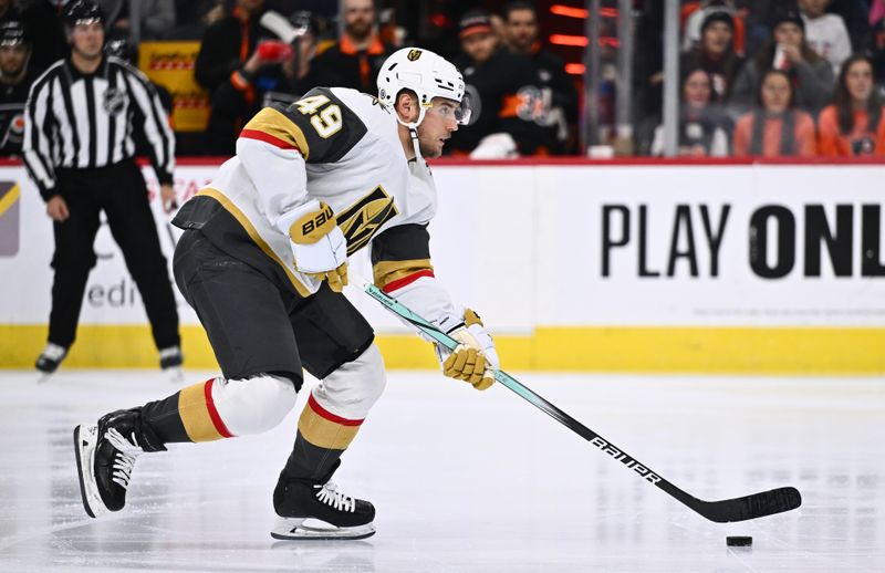 Nov 18, 2023; Philadelphia, Pennsylvania, USA; Vegas Golden Knights center Ivan Barbashev (49) controls the puck against the Philadelphia Flyers in the first period at Wells Fargo Center. Mandatory Credit: Kyle Ross-USA TODAY Sports