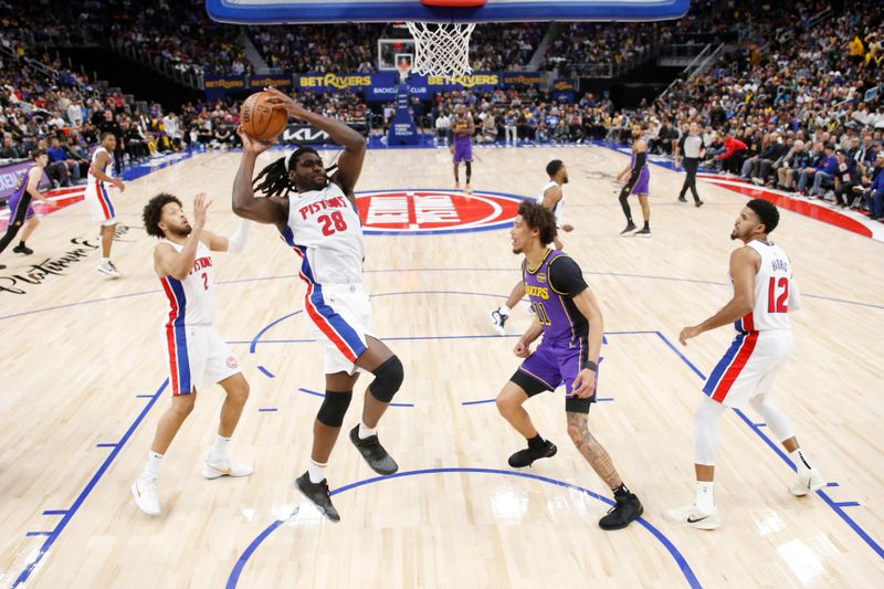 DETROIT, MI - NOVEMBER 4: Isaiah Stewart #28 of the Detroit Pistons rebounds the ball during the game against the Los Angeles Lakers on November 4, 2024 at Little Caesars Arena in Detroit, Michigan. NOTE TO USER: User expressly acknowledges and agrees that, by downloading and/or using this photograph, User is consenting to the terms and conditions of the Getty Images License Agreement. Mandatory Copyright Notice: Copyright 2024 NBAE (Photo by Brian Sevald/NBAE via Getty Images)