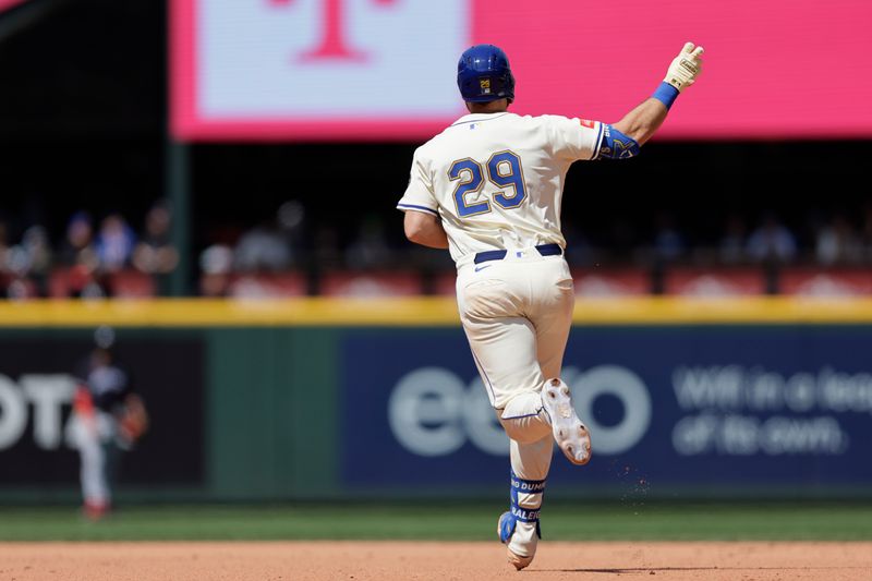 Jun 1, 2025; Seattle, Washington, USA; Seattle Mariners catcher Cal Raleigh (29) rounds the bases on a solo home run against the Minnesota Twins during the seventh inning at T-Mobile Park. Mandatory Credit: John Froschauer-Imagn Images