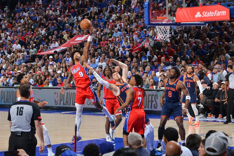 PHILADELPHIA, PA - APRIL 28: Kelly Oubre Jr. #9 of the Philadelphia 76ers rebounds the ball during the game against the New York Knicks during Round 1 Game 4 of the 2024 NBA Playoffs on April 28, 2024 at the Wells Fargo Center in Philadelphia, Pennsylvania NOTE TO USER: User expressly acknowledges and agrees that, by downloading and/or using this Photograph, user is consenting to the terms and conditions of the Getty Images License Agreement. Mandatory Copyright Notice: Copyright 2024 NBAE (Photo by Jesse D. Garrabrant/NBAE via Getty Images)