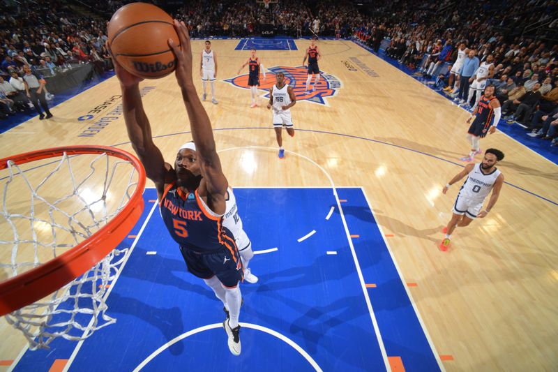 NEW YORK, NY - FEBRUARY 6: Precious Achiuwa #5 of the New York Knicks drives to the basket during the game against the Memphis Grizzlies on February 6, 2024 at Madison Square Garden in New York City, New York.  NOTE TO USER: User expressly acknowledges and agrees that, by downloading and or using this photograph, User is consenting to the terms and conditions of the Getty Images License Agreement. Mandatory Copyright Notice: Copyright 2024 NBAE  (Photo by Jesse D. Garrabrant/NBAE via Getty Images)