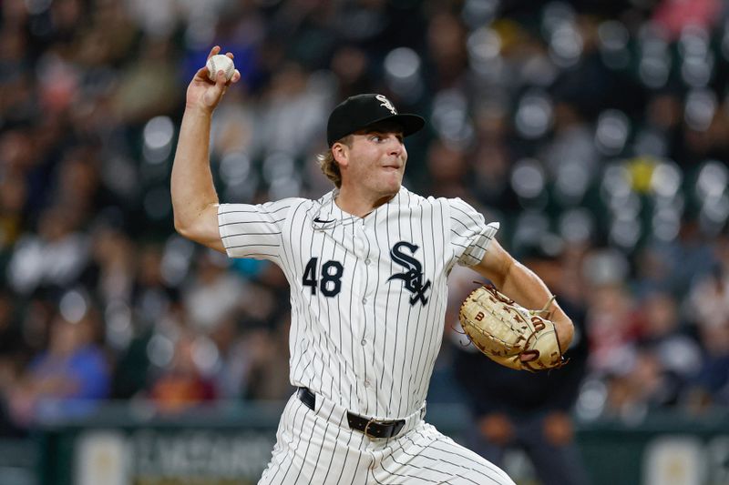 Sep 24, 2024; Chicago, Illinois, USA; Chicago White Sox starting pitcher Jonathan Cannon (48) delivers a pitch against the Los Angeles Angels during the first inning at Guaranteed Rate Field. Mandatory Credit: Kamil Krzaczynski-Imagn Images