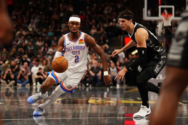 SAN ANTONIO, TX - NOVEMBER 19: Shai Gilgeous-Alexander #2 of the Oklahoma City Thunder dribbles the ball during the game against the San Antonio Spurs during the Emirates NBA Cup game on November 19, 2024 at the Frost Bank Center in San Antonio, Texas. NOTE TO USER: User expressly acknowledges and agrees that, by downloading and or using this photograph, user is consenting to the terms and conditions of the Getty Images License Agreement. Mandatory Copyright Notice: Copyright 2024 NBAE (Photos by Darren Carroll/NBAE via Getty Images)