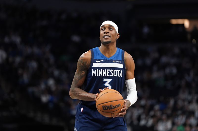 MINNEAPOLIS, MN -  MARCH 4:  Jaden McDaniels #3 of the Minnesota Timberwolves shoots a free throw during the game against the Philadelphia 76ers on March 4, 2025 at Target Center in Minneapolis, Minnesota. NOTE TO USER: User expressly acknowledges and agrees that, by downloading and or using this Photograph, user is consenting to the terms and conditions of the Getty Images License Agreement. Mandatory Copyright Notice: Copyright 2025 NBAE (Photo by Jordan Johnson/NBAE via Getty Images)