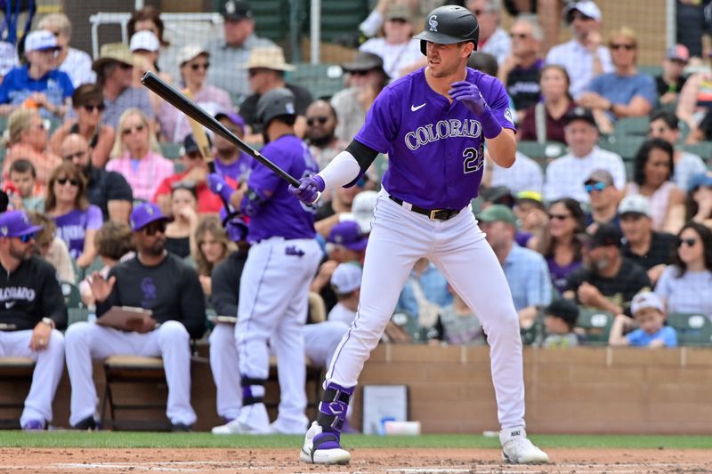 Mar 12, 2024; Salt River Pima-Maricopa, Arizona, USA;  Colorado Rockies right fielder Nolan Jones (22) at bat in the first inning against the Kansas City Royals during a spring training game at Salt River Fields at Talking Stick. Mandatory Credit: Matt Kartozian-USA TODAY Sports