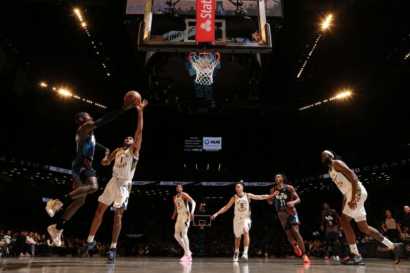 BROOKLYN, NY - APRIL 3: Dennis Schroder #17 of the Brooklyn Nets drives to the basket during the game against the Indiana Pacers on April 3, 2024 at Barclays Center in Brooklyn, New York. NOTE TO USER: User expressly acknowledges and agrees that, by downloading and or using this Photograph, user is consenting to the terms and conditions of the Getty Images License Agreement. Mandatory Copyright Notice: Copyright 2024 NBAE (Photo by Nathaniel S. Butler/NBAE via Getty Images)