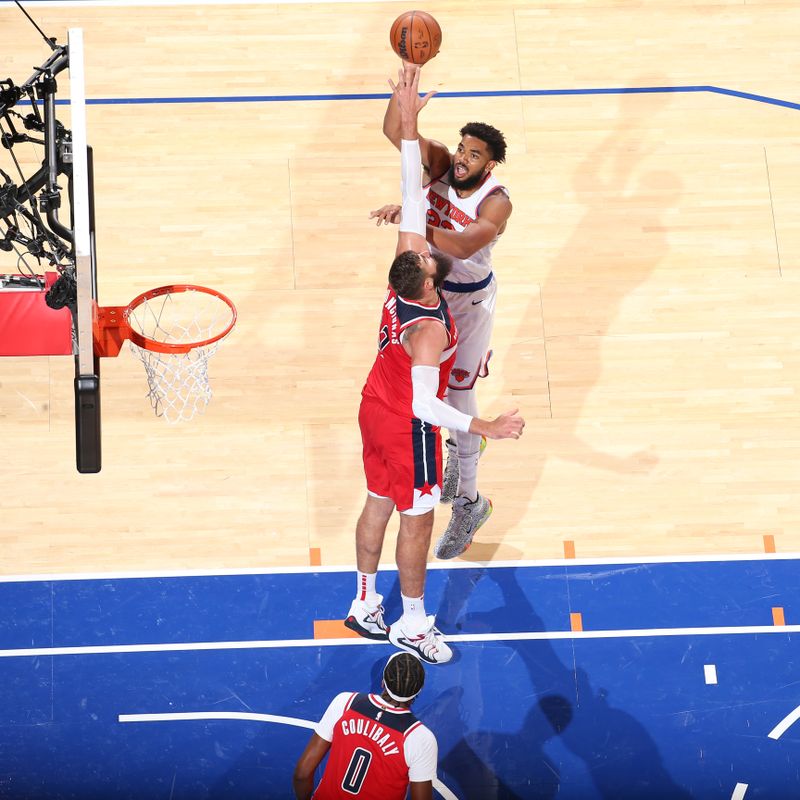 NEW YORK, NY - OCTOBER 9: Karl-Anthony Towns #32 of the New York Knicks drives to the basket during the game against the Washington Wizards during the 2024 NBA Preseason on October 9, 2024 at Madison Square Garden in New York City, New York.  NOTE TO USER: User expressly acknowledges and agrees that, by downloading and or using this photograph, User is consenting to the terms and conditions of the Getty Images License Agreement. Mandatory Copyright Notice: Copyright 2024 NBAE  (Photo by Nathaniel S. Butler/NBAE via Getty Images)