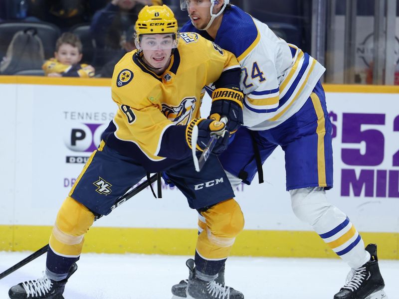 Mar 7, 2024; Nashville, Tennessee, USA; Nashville Predators center Cody Glass (8) competes for the puck with Buffalo Sabres center Dylan Cozens (24) at Bridgestone Arena. Mandatory Credit: Alan Poizner-USA TODAY Sports