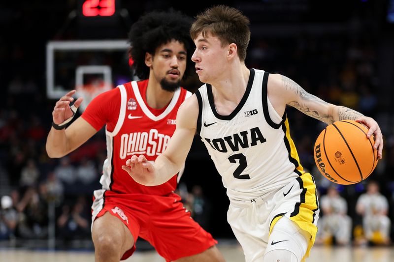 Mar 14, 2024; Minneapolis, MN, USA; Iowa Hawkeyes guard Brock Harding (2) wroks around Ohio State Buckeyes guard Taison Chatman (3) during the first half at Target Center. Mandatory Credit: Matt Krohn-USA TODAY Sports