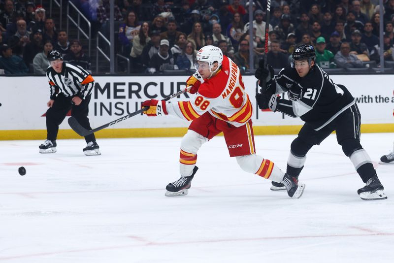 Dec 23, 2023; Los Angeles, California, USA; Calgary Flames left wing Andrew Mangiapane (88) shoots during the first period against the Los Angeles Kings at Crypto.com Arena. Mandatory Credit: Jessica Alcheh-USA TODAY Sports