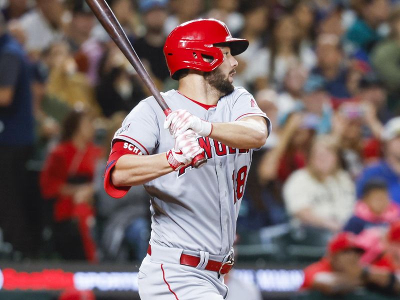 Sep 12, 2023; Seattle, Washington, USA; Los Angeles Angels first baseman Nolan Schanuel (18) hits a single against the Seattle Mariners during the third inning at T-Mobile Park. Mandatory Credit: Joe Nicholson-USA TODAY Sports