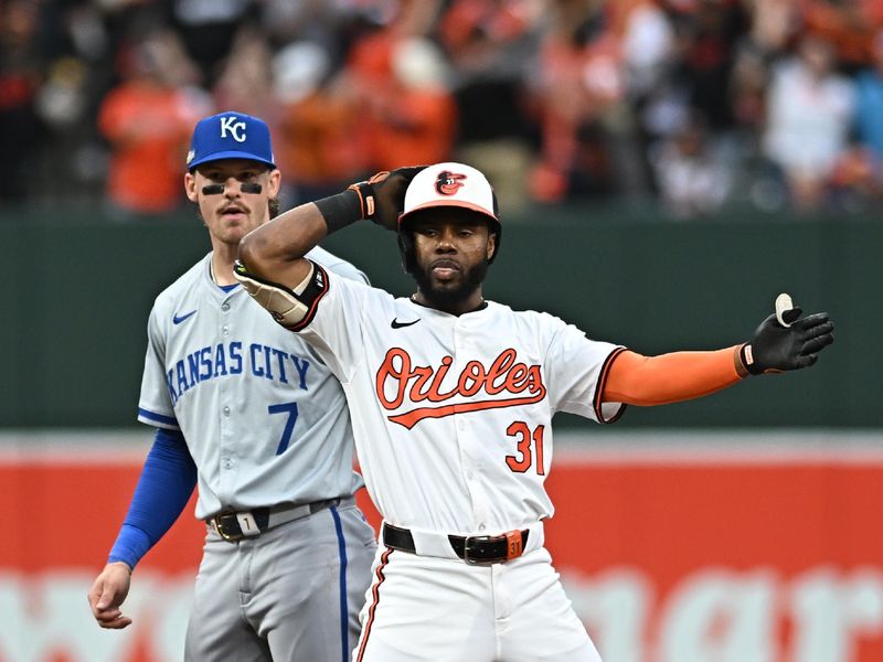 Oct 1, 2024; Baltimore, Maryland, USA; Baltimore Orioles outfielder Cedric Mullins (31) reacts after a double against the Kansas City Royals in game one of the Wild Card round for the 2024 MLB Playoffs at Oriole Park at Camden Yards. Mandatory Credit: Tommy Gilligan-Imagn Images